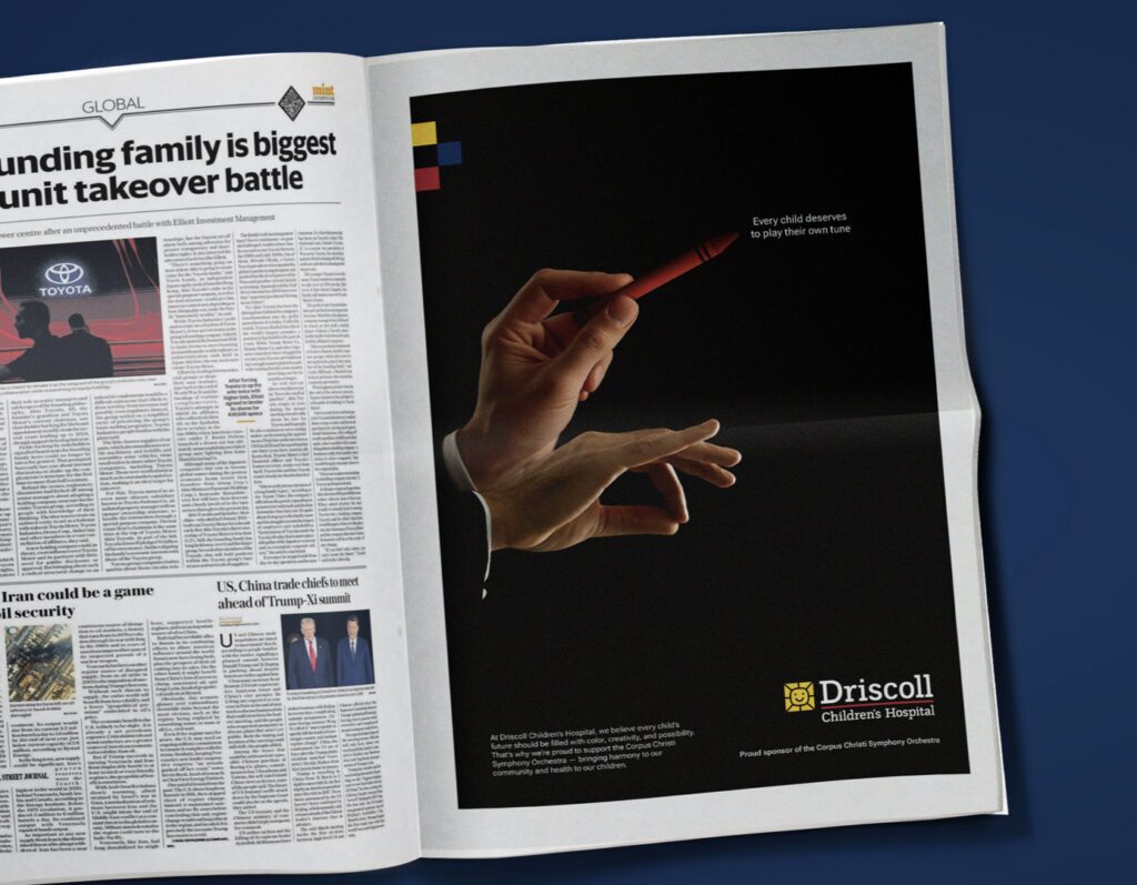 An ad featuring a composer holding a crayon