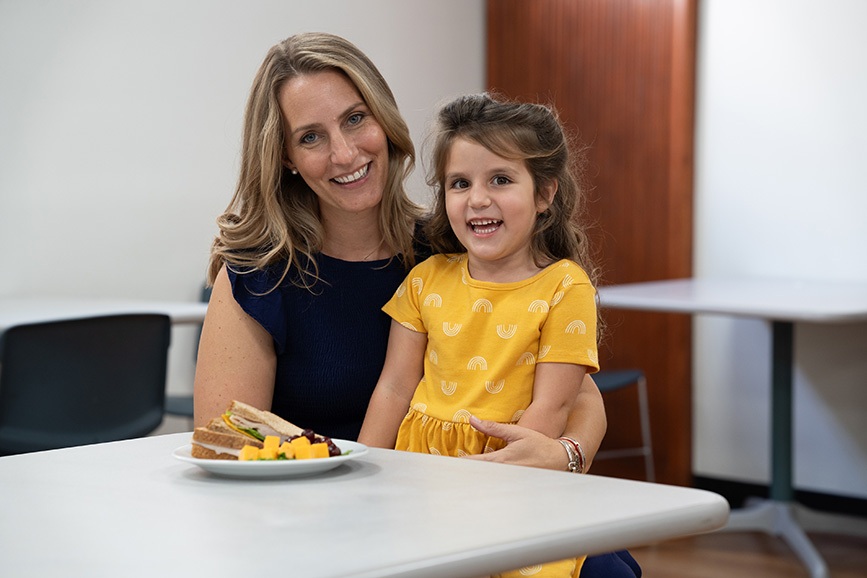 Mother and daughter with a healthy lunch at Driscoll Childrens cafeteria.