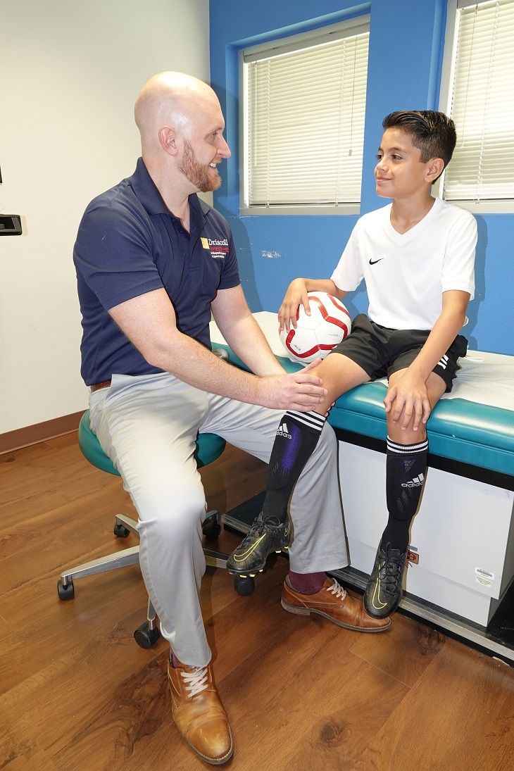Sport Med Doctor with patient